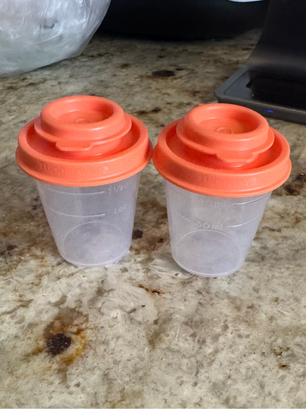 Pair of Clear Tupperware salt and pepper shakers